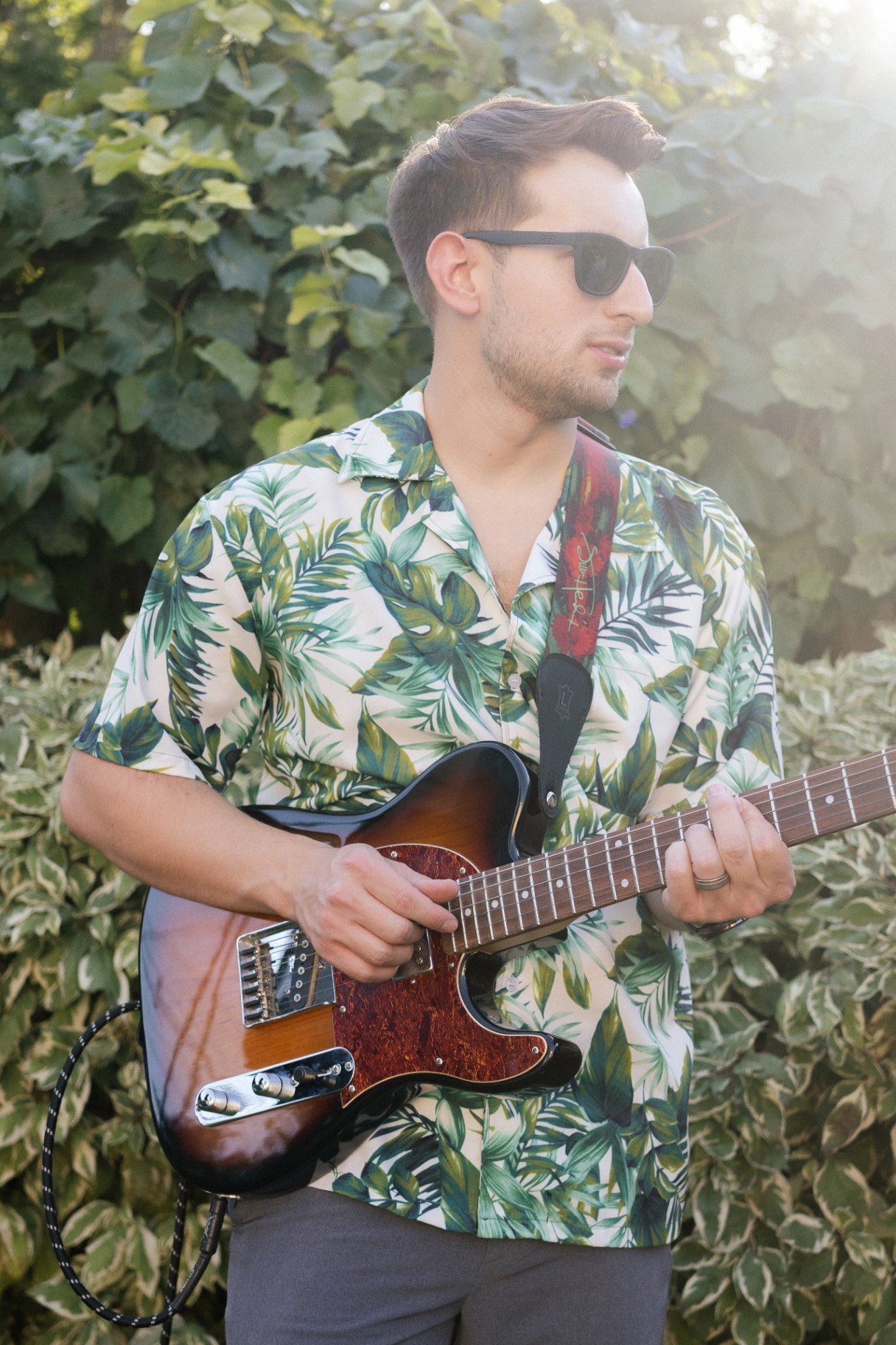 Guitarist in tropical shirt with telecaster
